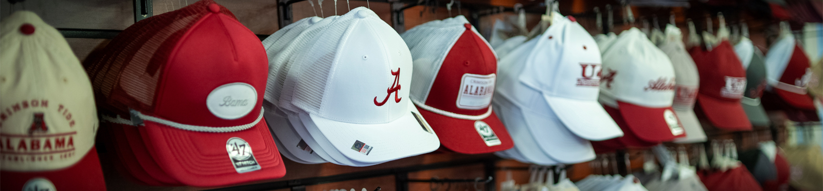 Top it off with a hat from our great selection - available now at the University of Alabama Supply Store!